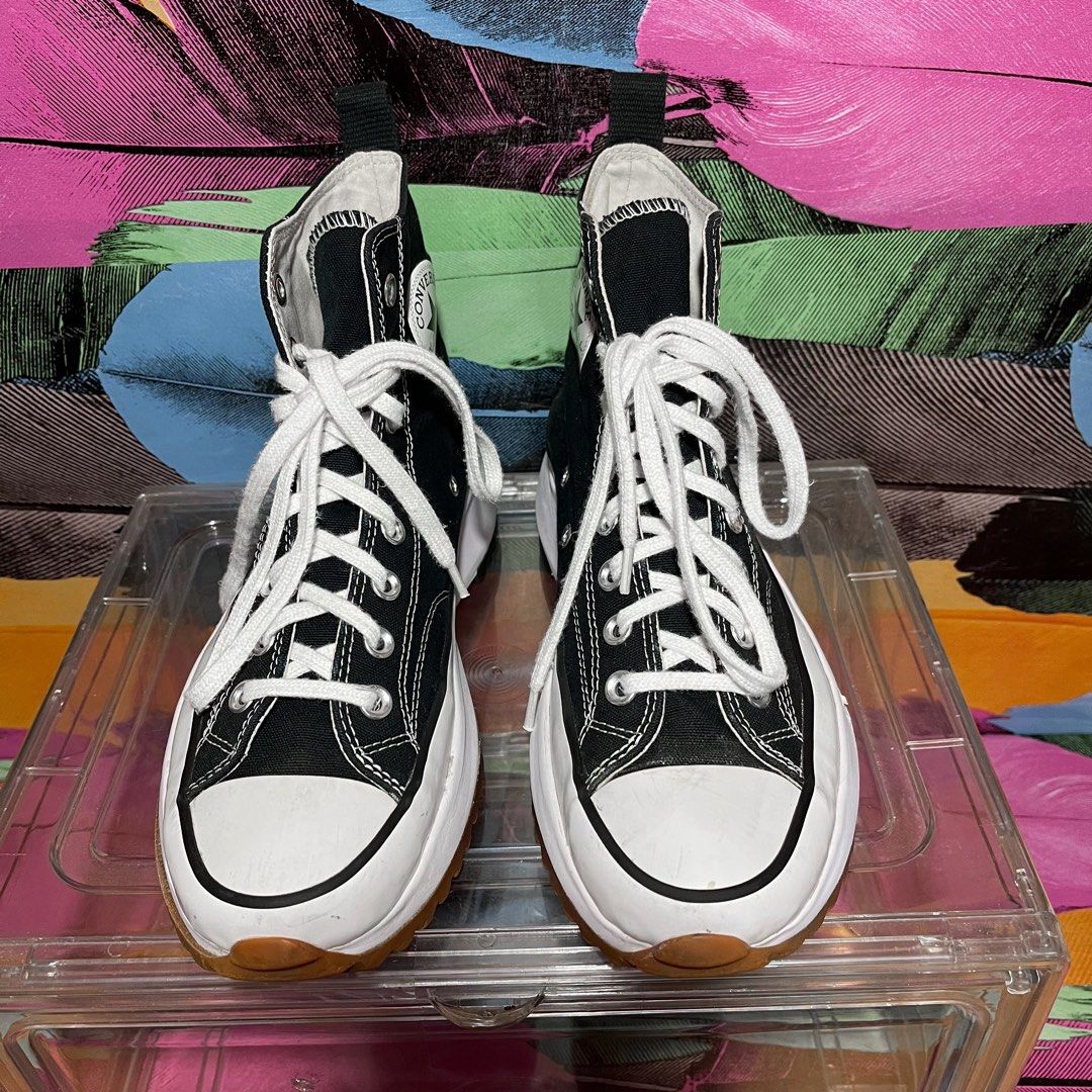 Converse Chuck Taylor Run Star Hike Black (Category: Sneakers) located in Leyte. Submitted by shoptastic_ph (Listing ID 1433972258, Image 3). Description: - Converse Run Star Hike sneakers - Color: Black - Features a platform sole with a star design on the heel - White laces - Iconic Converse All Star logo - Size indicated on inner label - Made in Vietnam.