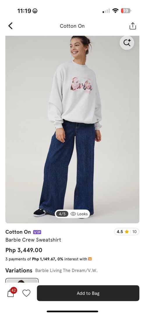 Cotton On Barbie Crew Sweatshirt (Category: Longsleeves) located in Manila. Submitted by kaia_studios (Listing ID 1433938764, Image 3). Description: - Cotton On Barbie Crew Sweatshirt - Bought in Zalora worn twice, you can check it there - Size: Small (oversized) - Features a Barbie graphic on the front - "Living The Dream Life" graphic on the back - Made of soft, light-colored fabric - Crew neck - Long sleeves - Ideal for casual wear.