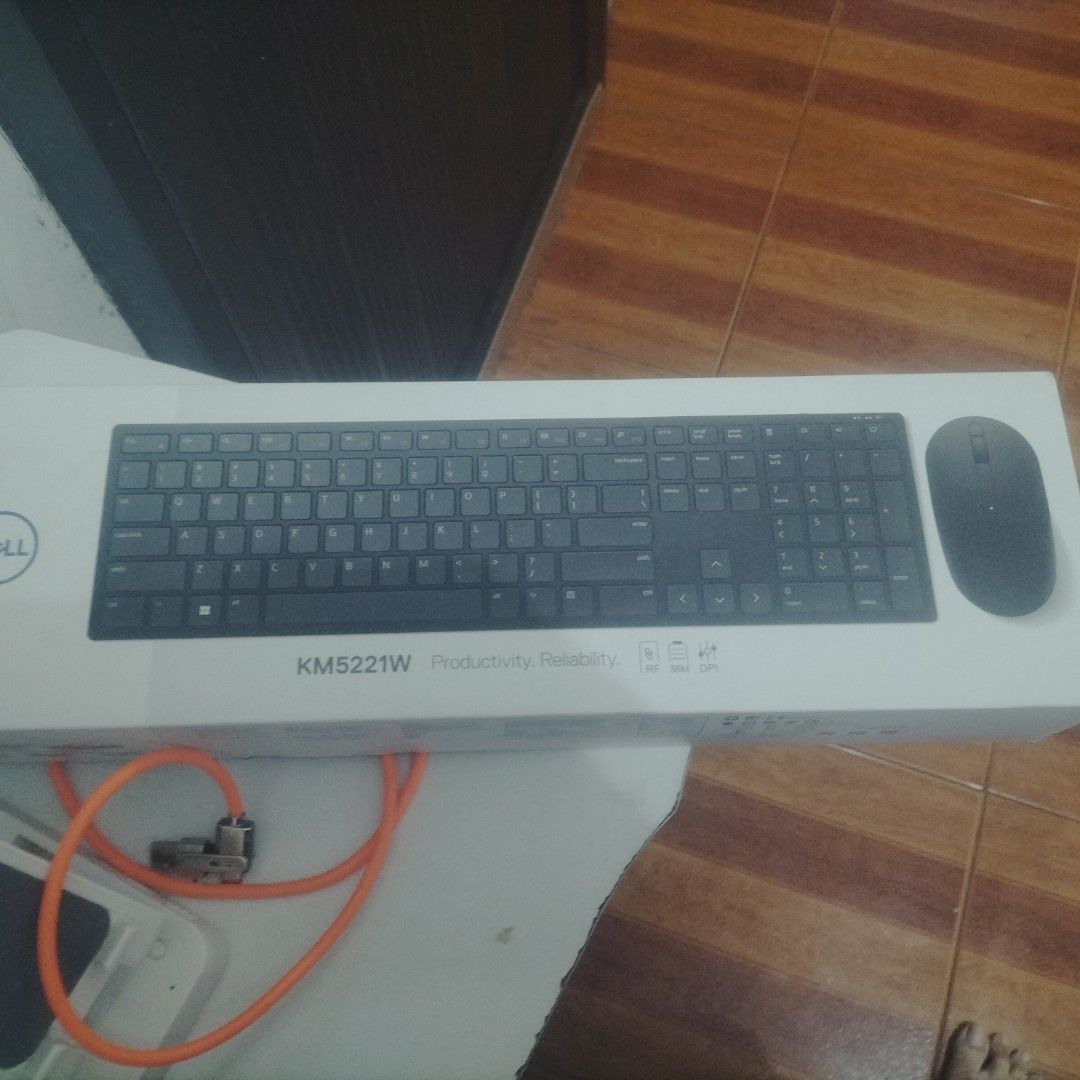 Dell KM5221W Wireless Keyboard and Mouse Combo (Category: Computer Keyboard) located in Quezon City. Submitted by magaydefamilia (Listing ID 1433895306, Image 2). Description: - Dell KM5221W wireless keyboard and mouse combo - Includes a black, full-layout keyboard with number pad - Also includes a black mouse - Comes in a white box with the Dell logo - Designed for "Productivity. Reliability.".