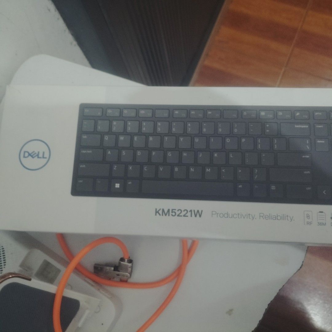 Dell KM5221W Wireless Keyboard and Mouse Combo (Category: Computer Keyboard) located in Quezon City. Submitted by magaydefamilia (Listing ID 1433895306, Image 3). Description: - Dell KM5221W wireless keyboard and mouse combo - Includes a black, full-layout keyboard with number pad - Also includes a black mouse - Comes in a white box with the Dell logo - Designed for "Productivity. Reliability.".