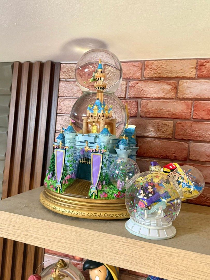 Disney Cinderella Castle with Tinkerbell Snow Globe (Category: Figurines & Statues) located in Manila. Submitted by blueseamarketing (Listing ID 1433794975, Image 1). Description: Tinkerbell rotates Lights up Glitter blower working Music working No winding key .