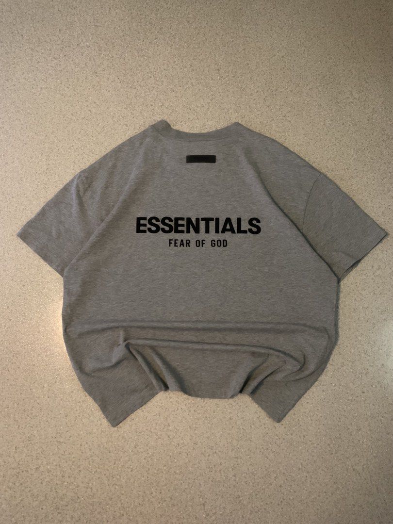 Essentials Fear of God Grey T-shirt (Category: Tshirts & Polo Shirts ) located in Manila. Submitted by condevilla19398 (Listing ID 1433851258, Image 2). Description: - Fear of God Essentials T-shirt - Color: Grey - Size: M - Features the Essentials logo (front and back) - Made with comfortable fabric - Great for everyday wear.