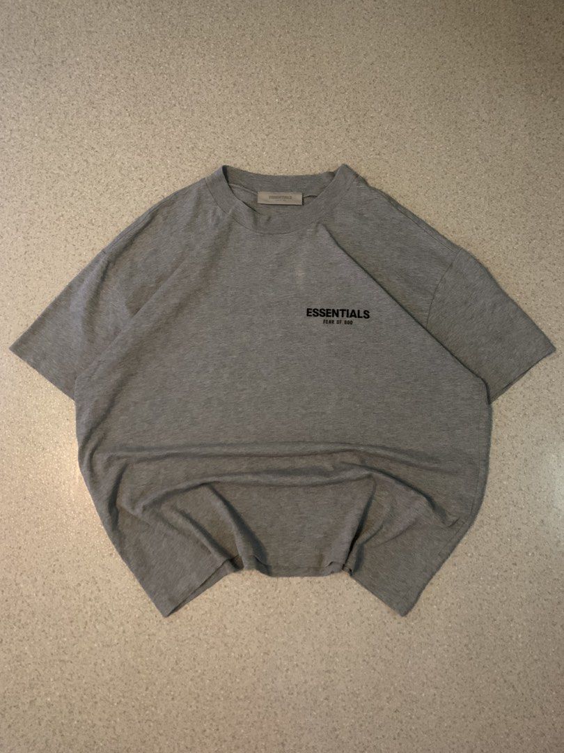 Essentials Fear of God Grey T-shirt (Category: Tshirts & Polo Shirts ) located in Manila. Submitted by condevilla19398 (Listing ID 1433851258, Image 1). Description: - Fear of God Essentials T-shirt - Color: Grey - Size: M - Features the Essentials logo (front and back) - Made with comfortable fabric - Great for everyday wear.
