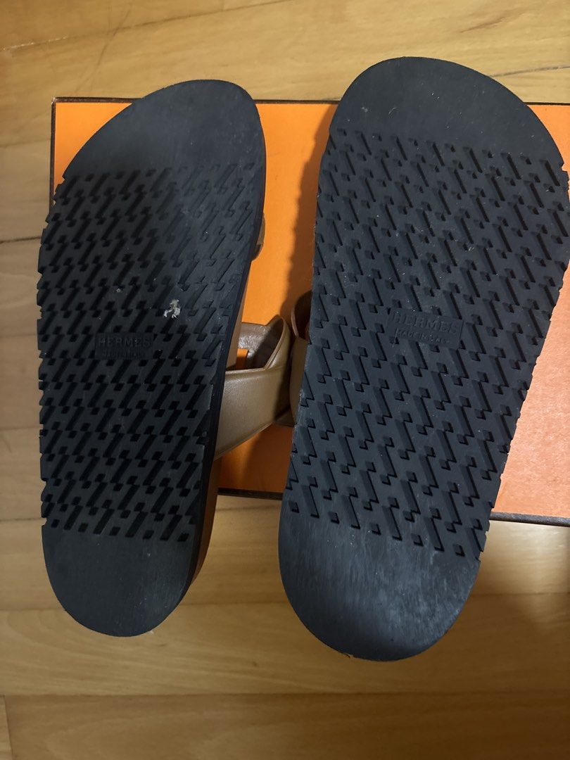Extra Sandles (Category: Sandals) located in Singapore. Submitted by franklint (Listing ID 1433919521, Image 2). Description: For this price pls use common sense - Color: gold - Includes original box and dust bags - Features iconic chain detail - Size: 38-39 Leather sandals .