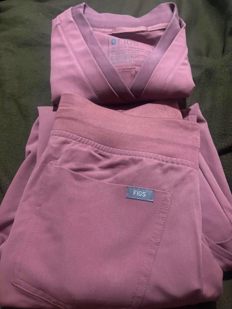 FIGS Scrubs Set - Mauve (Category: Sets or Coordinates) located in Tagum. Submitted by shyli_kuan (Listing ID 1433895185, Image 1). Description: - FIGS scrubs set - Mauve color - Includes top and pants - V-neck top - Pants with FIGS logo pocket - Smooth, comfortable material.