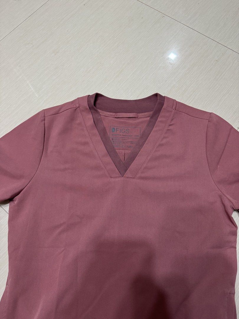 FIGS Scrubs Set - Mauve (Category: Sets or Coordinates) located in Tagum. Submitted by shyli_kuan (Listing ID 1433895185, Image 2). Description: - FIGS scrubs set - Mauve color - Includes top and pants - V-neck top - Pants with FIGS logo pocket - Smooth, comfortable material.