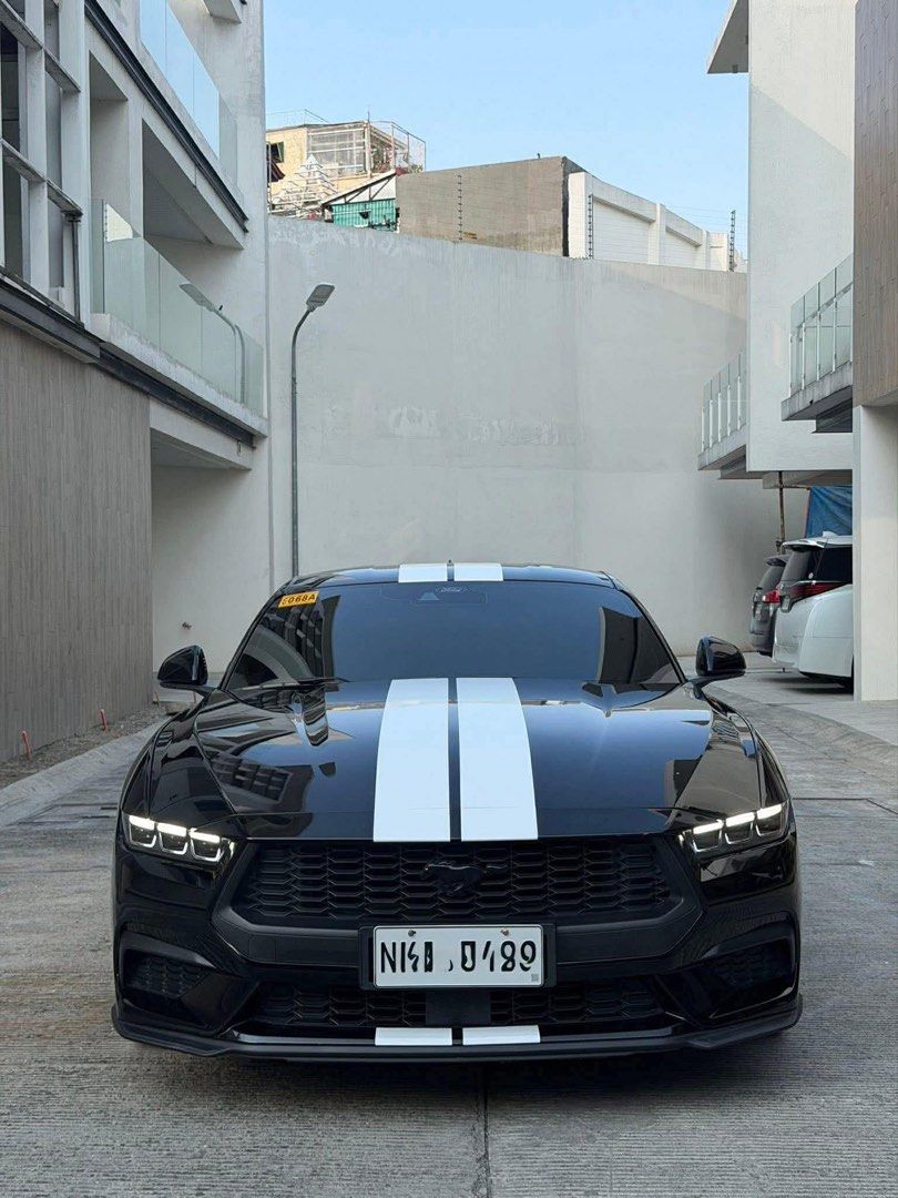 Ford Mustang Ecoboost 2.3L Auto (Category: Used Cars) located in Manila. Submitted by quality_cars (Listing ID 1433819513, Image 1). Description: New Arrival! Thank you, Lord! 🙏🏻 Naghahanap ka ba Ford Mustang na MATIPID sa gas?! I got you!!! 🥳 2024 Ford Mustang Ecoboost 2.3L Automatic Transmission 20,000 kms only! (Not tampered) All Original Paint (Black) Super Well Maintained/Newly PMS with receipts Big Brembo Brakes Front and Rear Recaro Rac