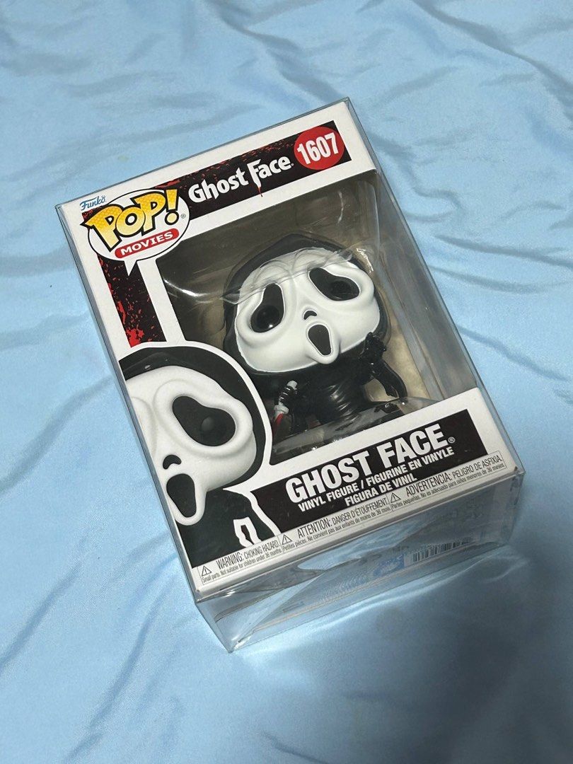 Funko Pop! Movies Ghost Face 1607 (Category: Designer & Blind Box Toys) located in Taguig. Submitted by kenni_cart (Listing ID 1433894211, Image 1). Description: - Funko Pop! Ghost Face figure from the Scream movie series. - Vinyl figure in original packaging. - Movies series #1607. - Features the iconic Ghost Face character. - Box displays the Funko Pop! logo and other figures in the series. - Free protective film.