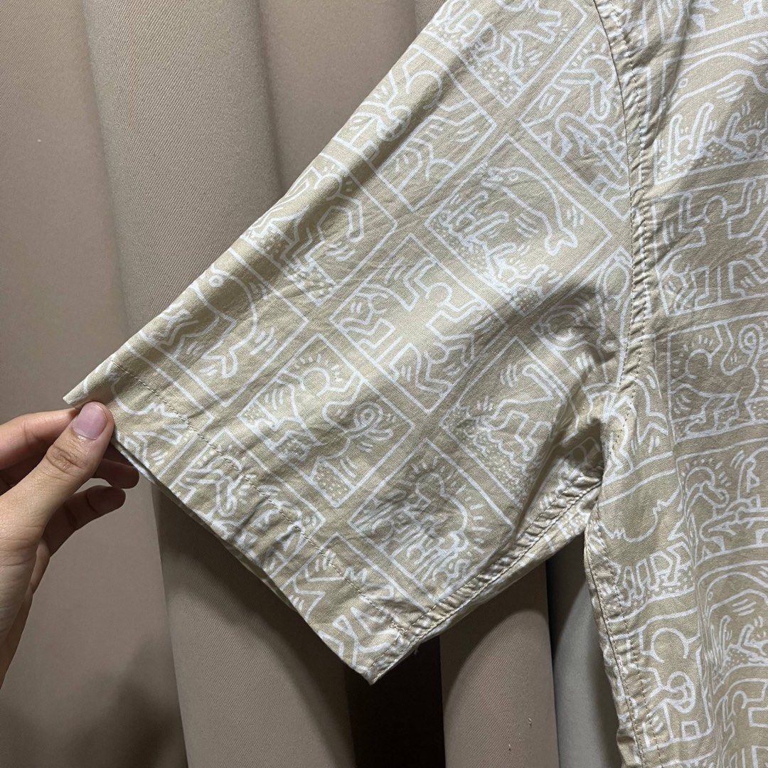 H&M x Keith Haring Beige Short Sleeve (Category: Tshirts & Polo Shirts ) located in Bulacan. Submitted by ishrm (Listing ID 1433878706, Image 3). Description: M-L No Issue Shoulder- 20in Sleeves- 11in Length- 28in Width- 22in MOD: J&T only MOP: GCash (Payment first).
