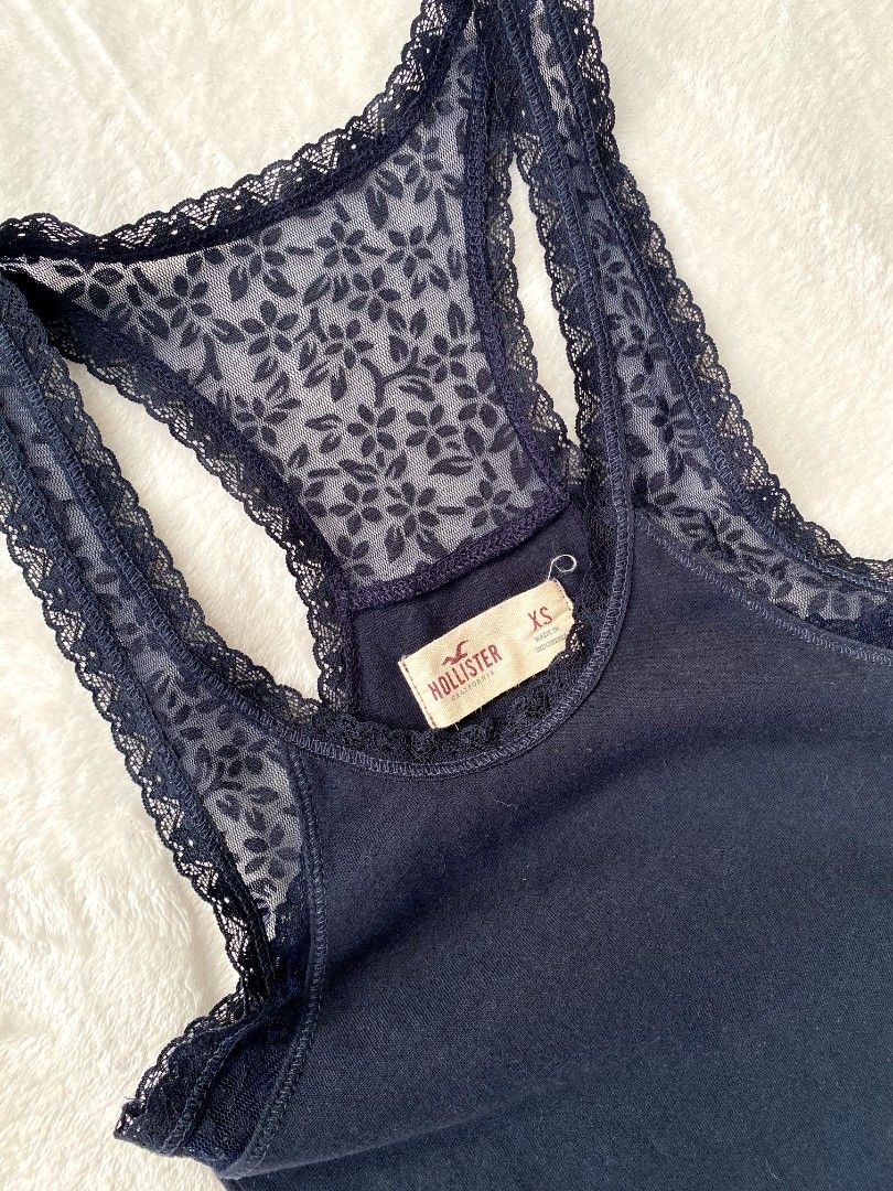 Hollister navy blue tank top (Category: Sleeveless) located in Quezon City. Submitted by kiseru (Listing ID 1433933909, Image 2). Description: no flaws stretchy xs-s.