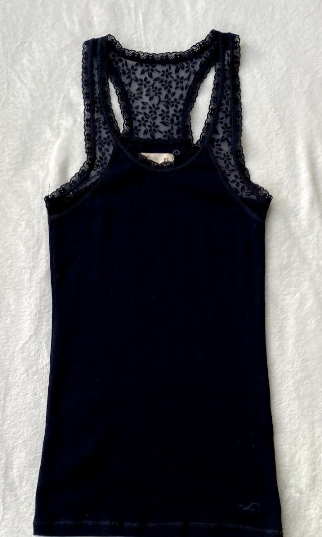 Hollister navy blue tank top (Category: Sleeveless) located in Quezon City. Submitted by kiseru (Listing ID 1433933909, Image 1). Description: no flaws stretchy xs-s.