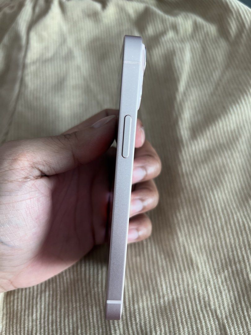 Iphone 13 mini 128gb (FOR SALE) (Category: iPhone 13 Series) located in Manila. Submitted by chardie00073451 (Listing ID 1433789263, Image 3). Description: Iphone 13 mini (pink) 128gb (original no history of repair) ✅all features are working smoothly ✅makinis with minimal dents lang ✅good as new ✅no history of repair ✅sobrang linaw ng camera at .5 Freebies -Lighting cable with adaptor -Magnetic case charger -used phone case ISSUE - Battery health