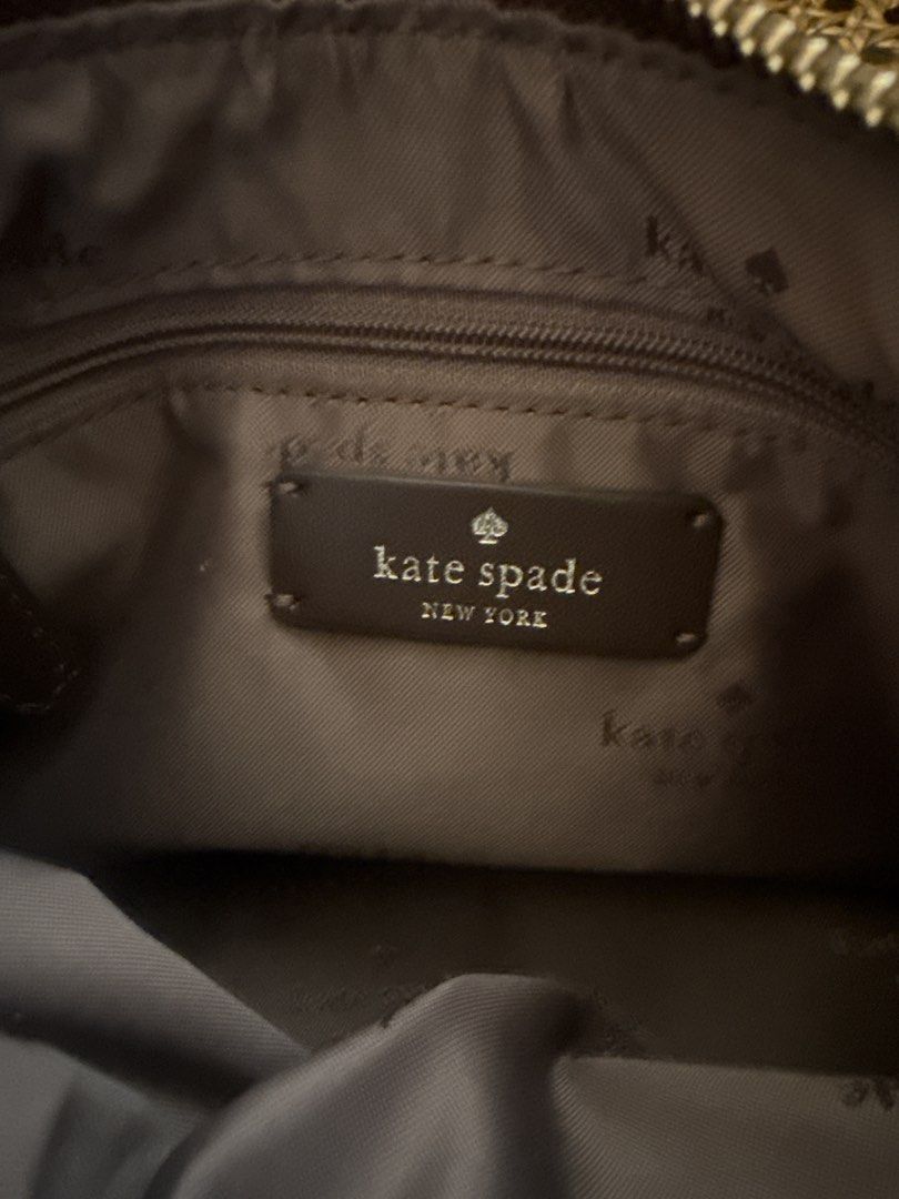 Kate Spade New York Shoulder Bag (Category: Luxury Bags & Wallets) located in Binan City. Submitted by toppicks715 (Listing ID 1433863786, Image 3). Description: - Hot Fudge (Brown) Kate Spade shoulder bag - Silver zipper - Small rectangular logo - Adjustable strap - Spacious interior - Kate Spade New York label inside - Comes with tag.