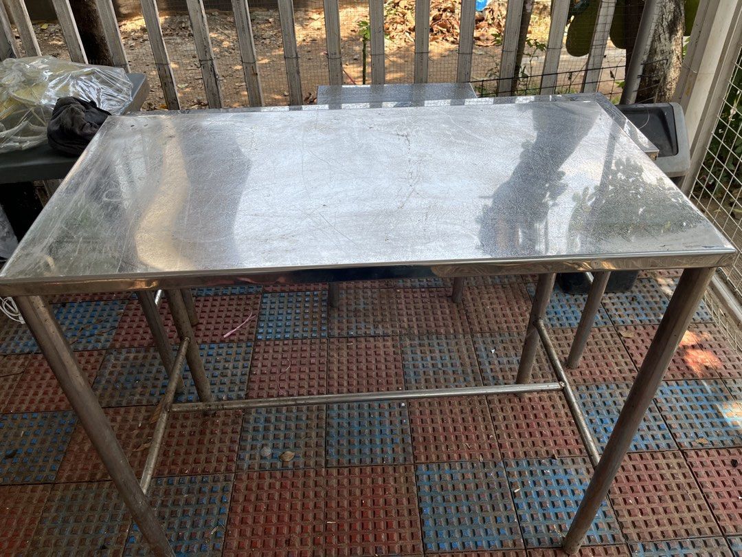 Kitchen Pure Stainless Table (Category: Tables & Sets) located in Manila. Submitted by myclairera32557 (Listing ID 1433807277, Image 2). Description: - Stainless steel table - Dimensions: 40" length x 21" width x 3 feet height - Sturdy and durable design - Includes a lower shelf for storage - Perfect for kitchen, workshop, or any workspace.