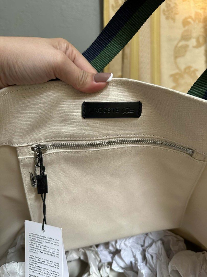 Lacoste Canvas Tote Bag (Category: Tote Bags) located in Manila. Submitted by itskeyemo (Listing ID 1433784497, Image 3). Description: Selling my used twice Lacoste Tote Bag. NO FLAWS, can pass as brand-new. Can do meet-up nearby or via Lalamove and/or J&T. Message me if interested. Thanks!.
