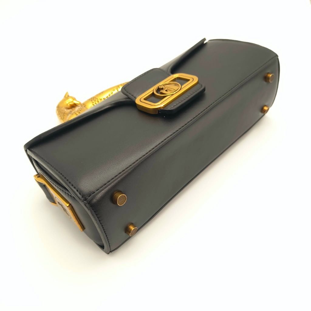 Lanvin Pencil Cat Black Box Calf Top Handle Bag (Category: Luxury Bags & Wallets) located in Cebu City. Submitted by theluxxaffair (Listing ID 1433960141, Image 2). Description: Lanvin Pencil Cat bag in black box calf leather. A structured top handle bag featuring the signature sculptural gold-tone feline handle and distinctive Mother & Child clasp. A highly unique design inspired by archival Lanvin elements, combining classic craftsmanship with 