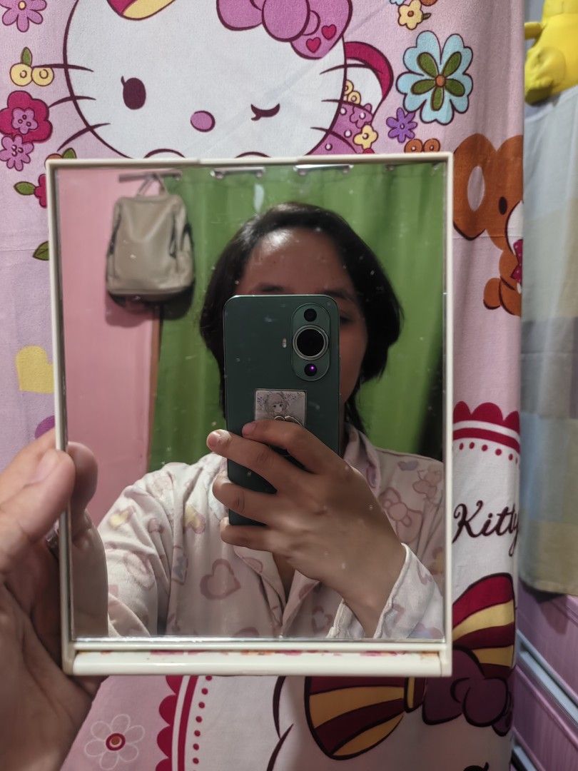 LIZ LISa Mirror (Category: Mirrors) located in Manila. Submitted by zaekim1380 (Listing ID 1433784142, Image 2). Description: - Floral design cover - Rectangular shape - White frame - Compact and portable - Features "IN LISA" print - Ideal for daily use.