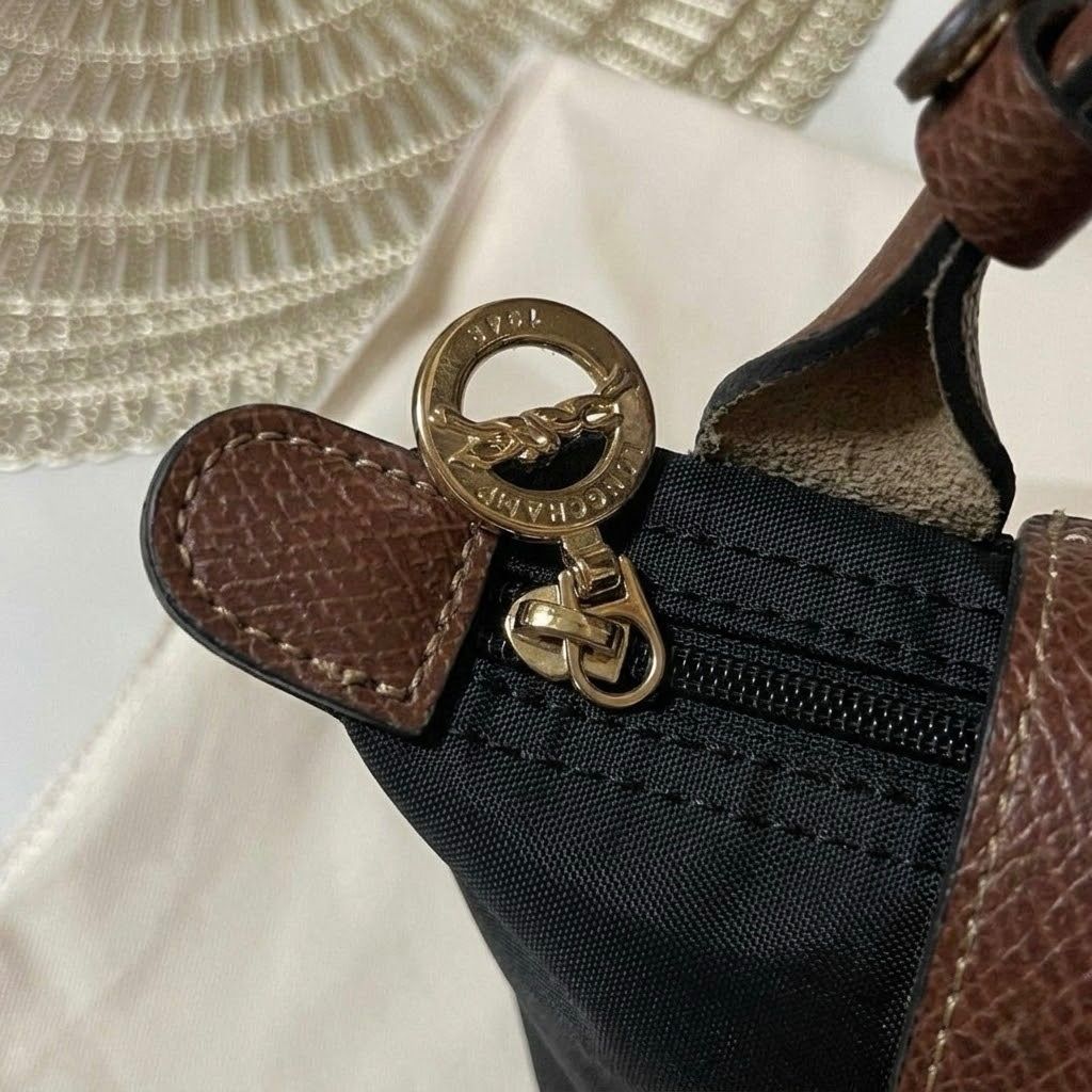 Longchamp le pliage mini sling coach crossbody bag (Category: Cross-body Bags) located in Subic. Submitted by poochieooo (Listing ID 1433864355, Image 3). Description: Preloved but in good condition Used twice Top tier quality from HK NGA!!! Price is such a steal!! Pls manage your expectations this is preloved/used (For sure buyers only) 🫶🏻.