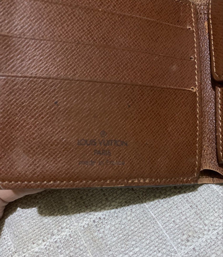 Louis Vuitton Monogram Wallet (Category: Luxury Bags & Wallets) located in Quezon City. Submitted by ncjnc (Listing ID 1433797890, Image 3). Description: - Authentic Louis Vuitton wallet - Classic Monogram pattern - Multiple card slots - Bill compartment - Light brown leather interior - Coin pocket with snap closure - Embossed "Louis Vuitton Paris Made in France".