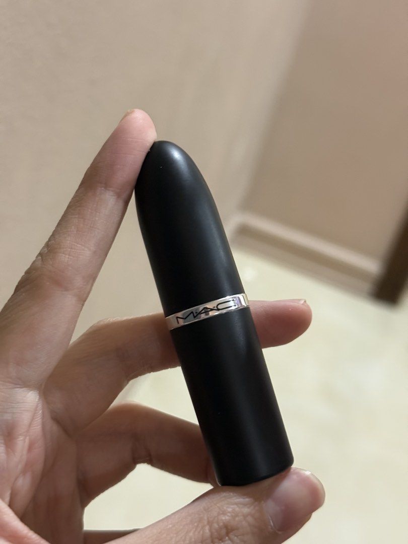 MAC Lipstick - Sitting Pretty (Category: Makeup) located in Taguig. Submitted by anmit (Listing ID 1433916689, Image 1). Description: - MAC Lipstick in 'Sitting Pretty' - Satin finish - Muted rose shade - Classic black tube with MAC logo Barely used. Swatched only.