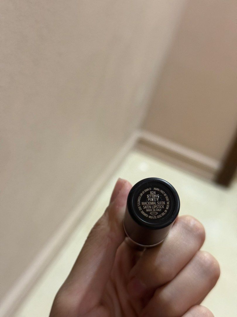 MAC Lipstick - Sitting Pretty (Category: Makeup) located in Taguig. Submitted by anmit (Listing ID 1433916689, Image 2). Description: - MAC Lipstick in 'Sitting Pretty' - Satin finish - Muted rose shade - Classic black tube with MAC logo Barely used. Swatched only.