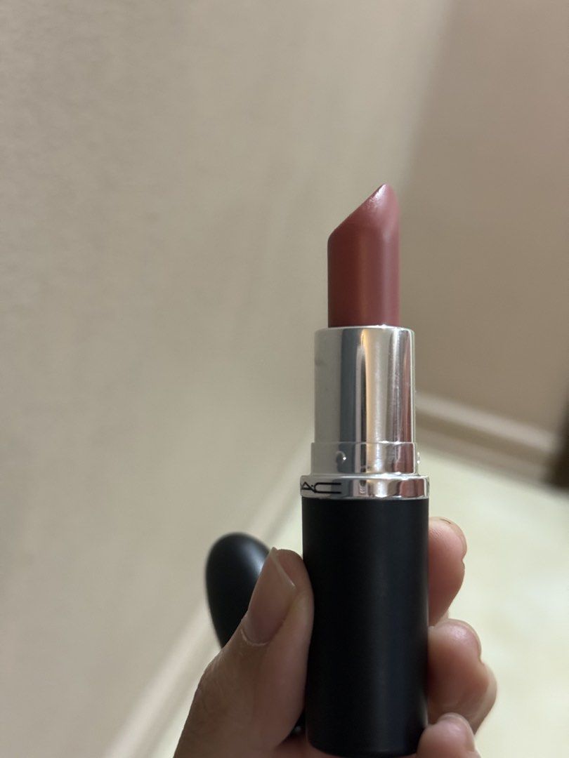 MAC Lipstick - Sitting Pretty (Category: Makeup) located in Taguig. Submitted by anmit (Listing ID 1433916689, Image 3). Description: - MAC Lipstick in 'Sitting Pretty' - Satin finish - Muted rose shade - Classic black tube with MAC logo Barely used. Swatched only.