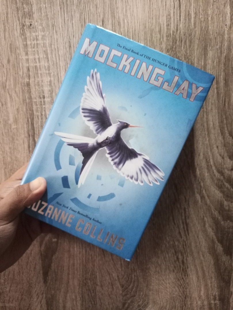 Mockingjay by Suzanne Collins (Category: Storybooks) located in Caloocan City. Submitted by miguelmitiam27 (Listing ID 1433795106, Image 1). Description: Mockingjay by Suzanne Collins [HARDBOUND] 250PHP RS: decluttering my bookshelves Issue: foxing on the book edges.