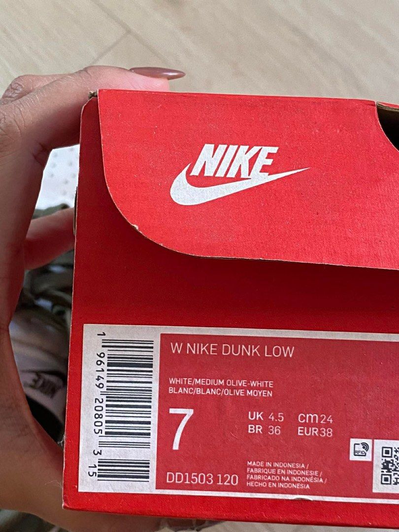 Nike Dunk Low White Medium Olive (Category: Sneakers) located in Manila. Submitted by itsdreann967 (Listing ID 1433903745, Image 2). Description: - Nike Dunk Low - Color: White and Medium Olive - Size: UK 4.5, US 7, EUR 38, 24 cm - Comes with original box NO ISSUE .