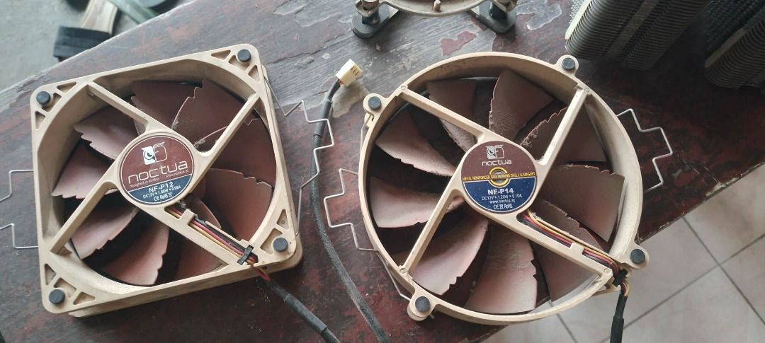 Noctua NH-D14 CPU Cooler with Fans (Category: Computer Parts) located in San Pedro. Submitted by gamer.since.80s (Listing ID 1433841775, Image 3). Description: - Noctua NH-D14 CPU cooler included - Features a dual-tower heatsink design - Comes with two Noctua fans (1pc. 120mm and 1pc. 140mm) - For intel 115X socket mounting hardware only - Ideal for high-performance builds.