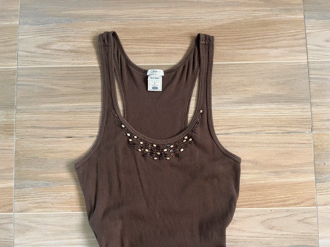 old navy beaded top (Category: Longsleeves) located in Pasay City. Submitted by cshell_sells (Listing ID 1433886345, Image 2). Description: - size: small to large - waist 24in - length 29in - stretchy - no issue/s - shipping fee to be covered by the buyer.