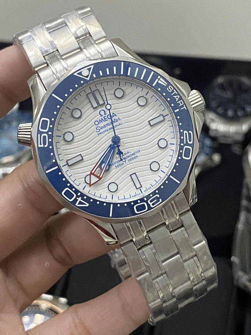 Omega Seamaster Professional Watch (Category: Luxury Watches) located in Manila. Submitted by donwatches15 (Listing ID 1433806423, Image 2). Description: - Omega Seamaster Professional watch - Stainless steel bracelet - Available in multiple dial and bezel colors - Features a distinctive wave pattern dial - Rotating bezel with timekeeping markings - Screw-down crown perfect for gift .