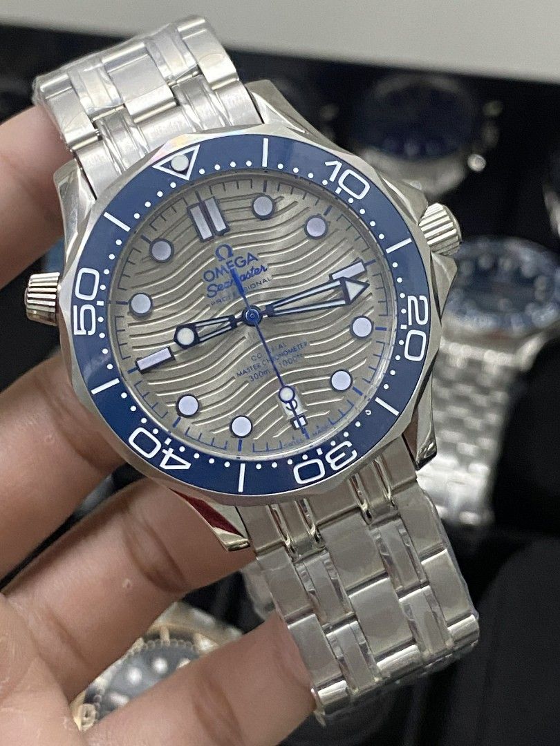 Omega Seamaster Professional Watch (Category: Luxury Watches) located in Manila. Submitted by donwatches15 (Listing ID 1433806423, Image 3). Description: - Omega Seamaster Professional watch - Stainless steel bracelet - Available in multiple dial and bezel colors - Features a distinctive wave pattern dial - Rotating bezel with timekeeping markings - Screw-down crown perfect for gift .