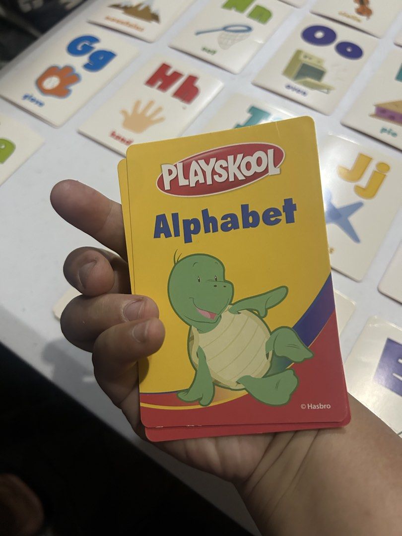 Playskool Alphabet Flash Cards (Category: Educational & Learning Toys) located in Paranaque City. Submitted by allthatclutterph (Listing ID 1433932287, Image 2). Description: - Playskool Alphabet Flash Cards - Features letters A to Z. - Some letters have extra cards like B - Includes corresponding pictures for each letter. - Each card has a letter, a word, and an image. - Designed for educational use. - Suitable for young children. - Colorful ill
