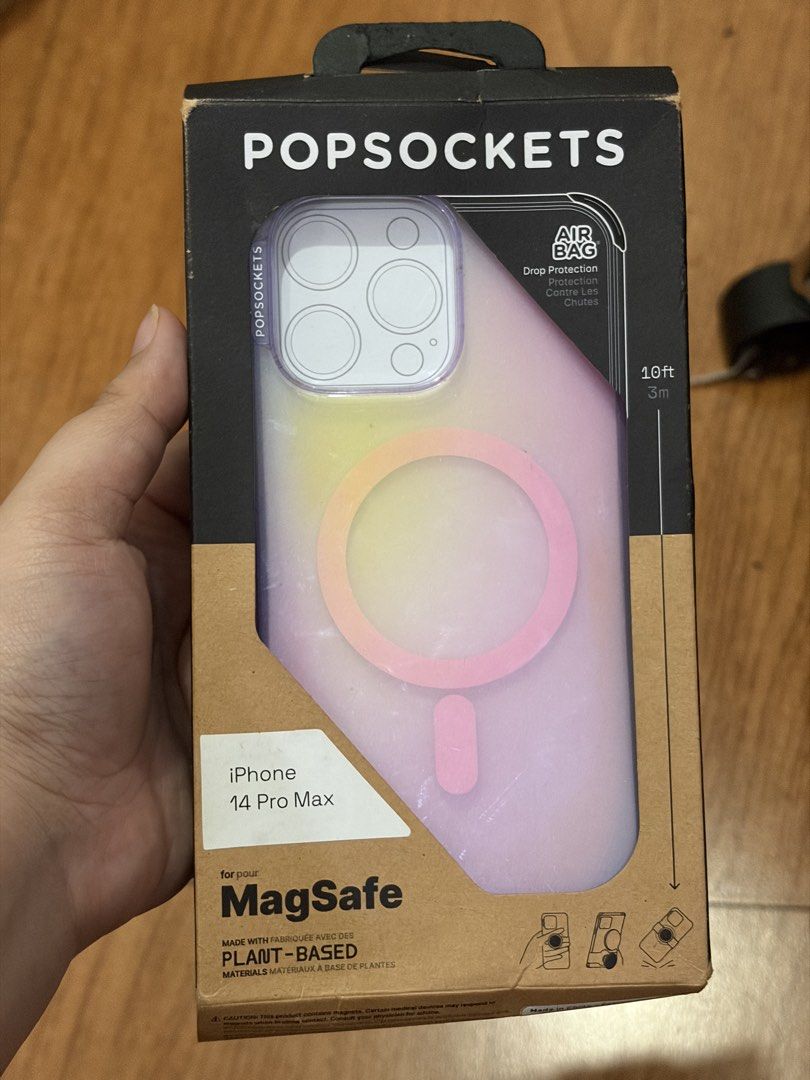 Popsocket case aura (Category: Cases & Sleeves) located in Quezon City. Submitted by stuffyy (Listing ID 1433788970, Image 1). Description: - Popsocket Aura Case - Designed for iPhone 14 Pro Max - Features an iridescent color - Made with plant-based materials - MagSafe compatible This is well used hence the price. The back part is very makinis.
