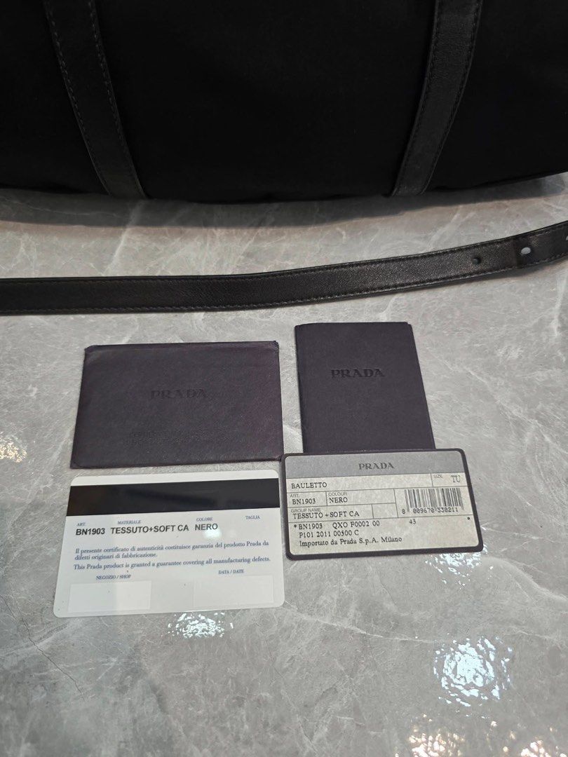 prada black tesutto with gold hardware (Category: Luxury Bags & Wallets) located in Davao. Submitted by jackie2276 (Listing ID 1433962053, Image 2). Description: in good condition, complete with cards.