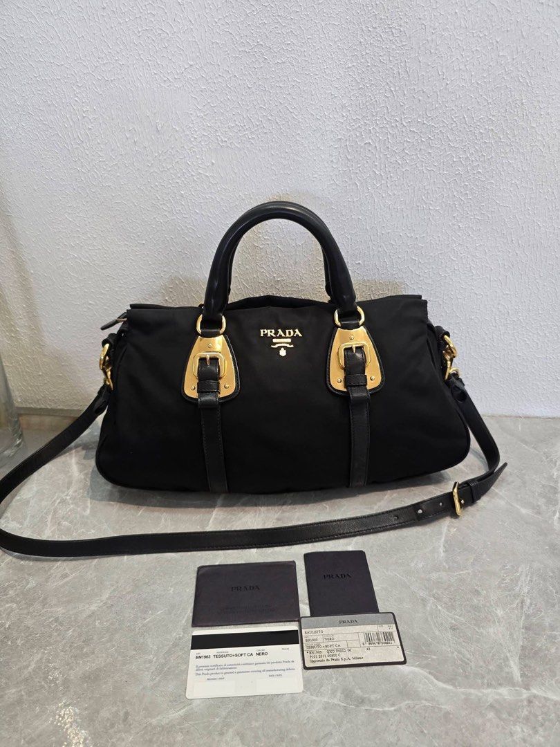 prada black tesutto with gold hardware (Category: Luxury Bags & Wallets) located in Davao. Submitted by jackie2276 (Listing ID 1433962053, Image 1). Description: in good condition, complete with cards.