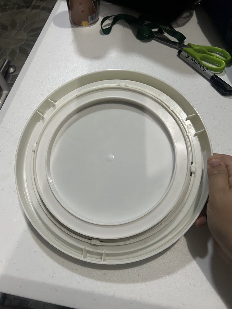 Round Rotating Tray / Lazy Susan (Category: Other Kitchenware & Tableware) located in Paranaque City. Submitted by allthatclutterph (Listing ID 1433939947, Image 2). Description: - 25cm diameter - Rotating tray for easy access to items. - Features a stylish gray, textured surface. - Elegant white rim. - Rotates smoothly for convenience. - Great for kitchen, pantry, or any area needing organization. - .