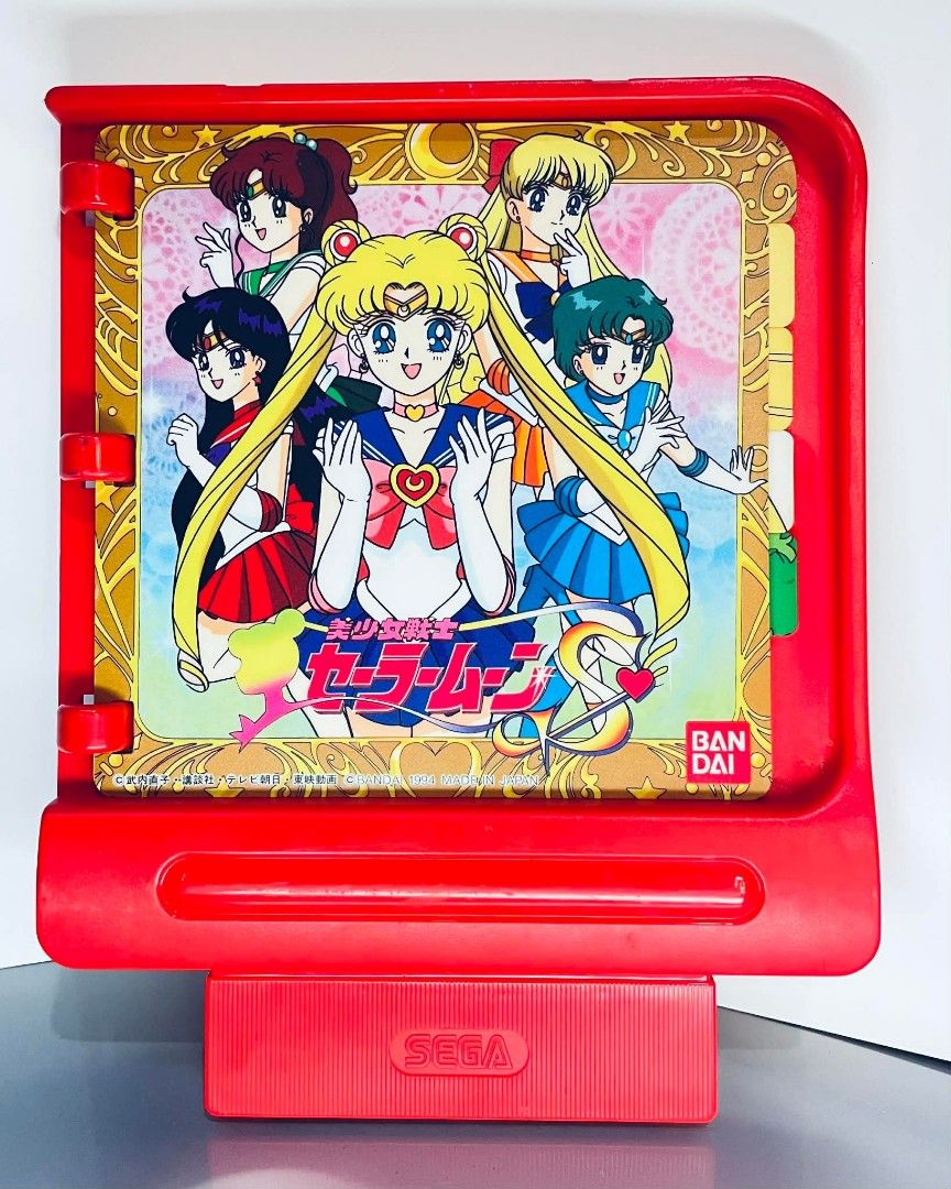Sailor Moon Sega Game (Category: Nintendo) located in Pililla. Submitted by mitch0929 (Listing ID 1433847603, Image 1). Description: - Vintage Sailor Moon Sega game - Features iconic Sailor Moon characters - Red cartridge design - Sega logo present - Perfect collectible for Sailor Moon enthusiasts.