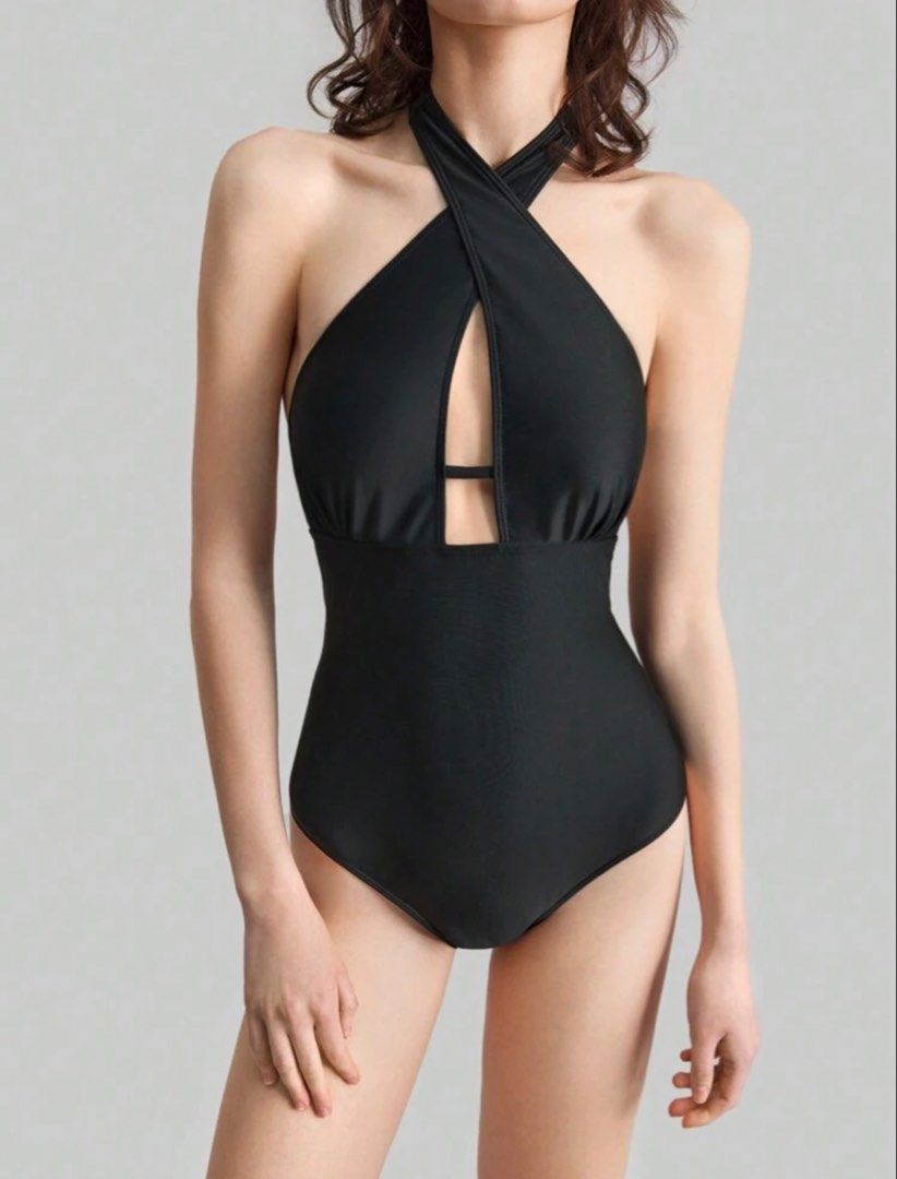 Shein Black Halter Neck Swimsuit (Category: Bikinis & Swimsuits) located in Manila. Submitted by decluterrracct (Listing ID 1433971740, Image 1). Description: Black Backless Halter One-Piece Swimsuit Size: M Condition: Preloved (worn once, like new) Minimalist yet super flattering ✨ This sleek black one-piece features a backless cut with adjustable halter and back ties for a secure, customizable fit. Perfect for beach days, poolside lounging, or 