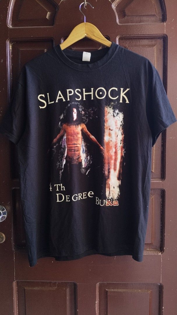 Slapshock 4th Degree Burn T-Shirt (Category: Tshirts & Polo Shirts ) located in Manila. Submitted by opthrift.shop (Listing ID 1433795305, Image 1). Description: - Slapshock band t-shirt - Features "4th Degree Burn" album art (front) - Band photo on the back - Brand: Fruit of the Loom - Size: L.
