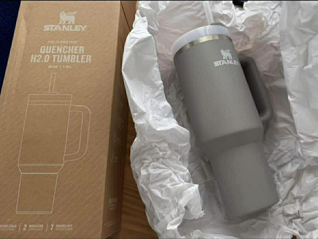 Stanley Quencher H2.0 Tumbler 40oz (Category: Water Bottles & Tumblers) located in Pasay City. Submitted by theprelovededit.2026 (Listing ID 1433866886, Image 1). Description: - Stanley Quencher H2.0 Tumbler - 40oz capacity - Gray color - Includes handle and straw - Keeps drinks cold for up to 2 days - Keeps drinks hot for up to 7 hours - Comes with original box.