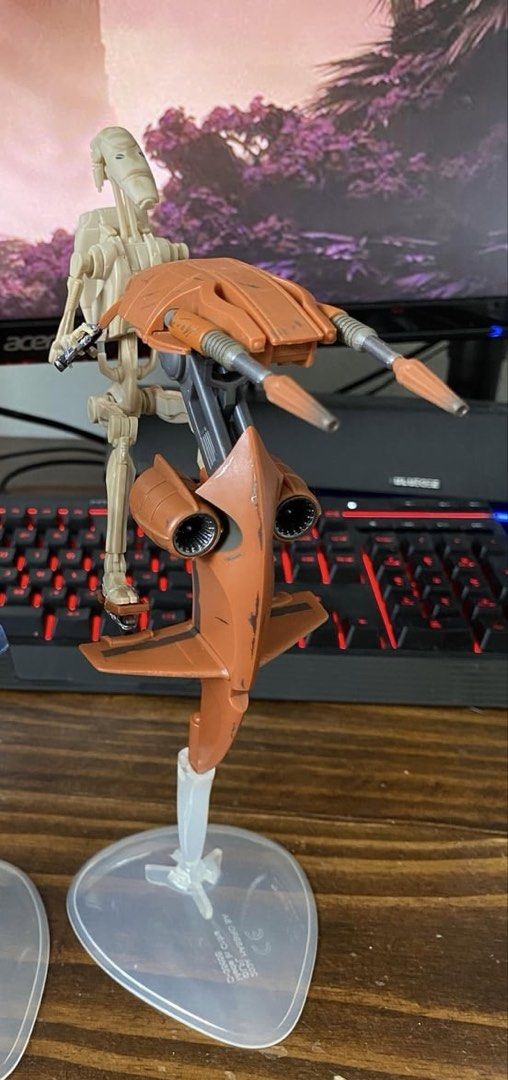 Star Wars Black Seris Battle Droid with STAP (Category: Figurines & Statues) located in Quezon City. Submitted by collectorsoftheforceph (Listing ID 1433878725, Image 2). Description: - No Box | 4 pcs available - Star Wars Battle Droid action figure. - Includes STAP vehicle (brown and gray). - Battle Droid in standing position. - Mounted on a clear display stand. - Perfect for Star Wars collectors..