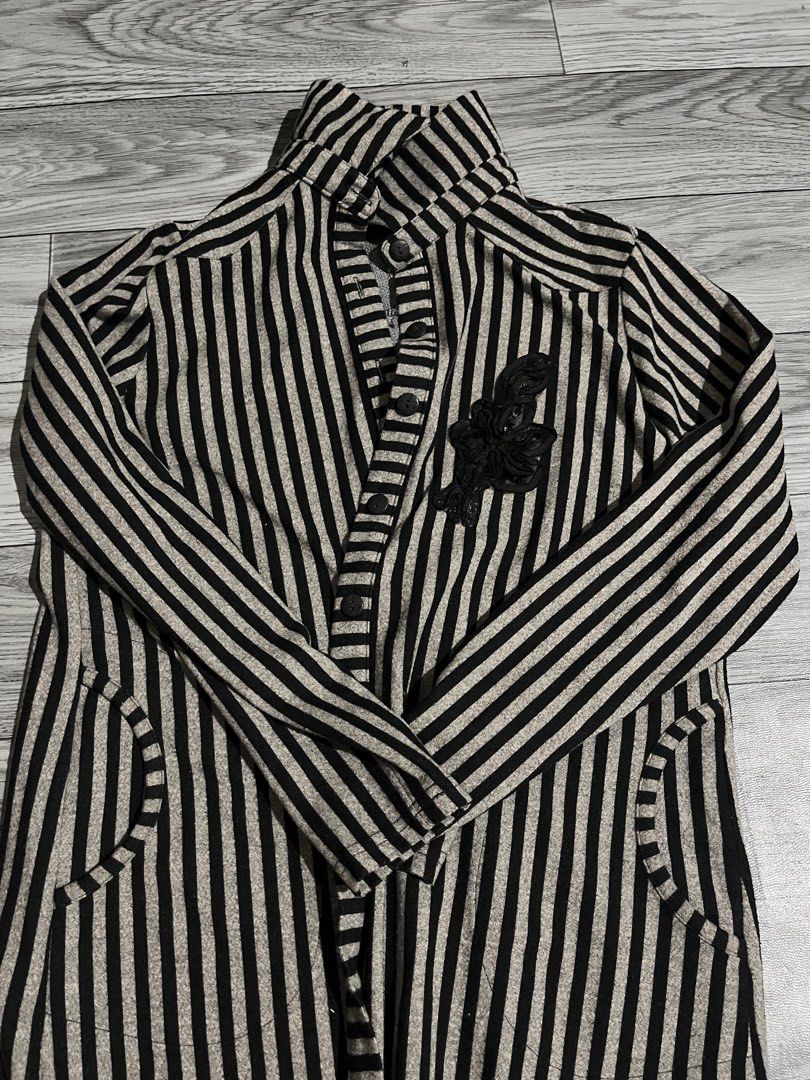 Striped Long Sleeve Shirt (Category: Tshirts & Polo Shirts ) located in Pasig City. Submitted by anya2000 (Listing ID 1433898118, Image 3). Description: - Long sleeve shirt - Vertical black and beige stripes - High collar - Button-down front - Two pockets - Decorative black applique on chest - Textured fabric -xl tag but can fit to medium ppl.