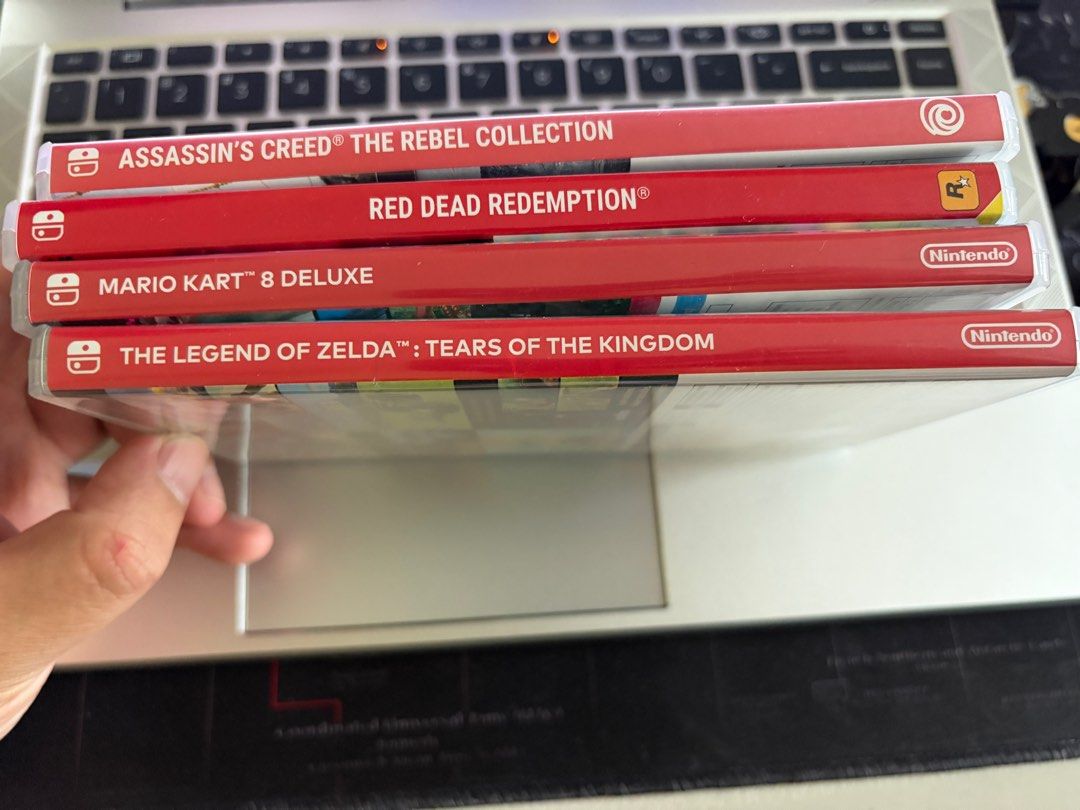 Switch games (Category: Nintendo) located in Taguig. Submitted by nivla23 (Listing ID 1433887420, Image 1). Description: Selling Switch Games Red dead 1800 Mario kart 1800 sold Assassins Creed Black flag 1500 Zelda Tears of the kingdom 1900 Good as new, still negotiable. Meet up Tanay Rizal or COP via LBC.