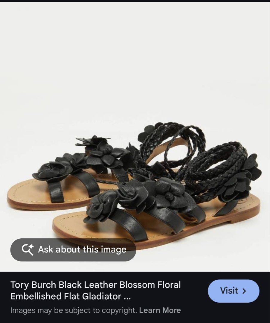 Tory Burch Black Leather Blossom Gladiator Sandals (Category: Flats & Sandals) located in Muntinlupa City. Submitted by sungbora90 (Listing ID 1433852464, Image 1). Description: - Tory Burch sandals - Black leather straps - Floral embellishments - Flat sole - Ankle strap - Light brown footbed with Tory Burch logo - Dark brown textured sole - Size L.