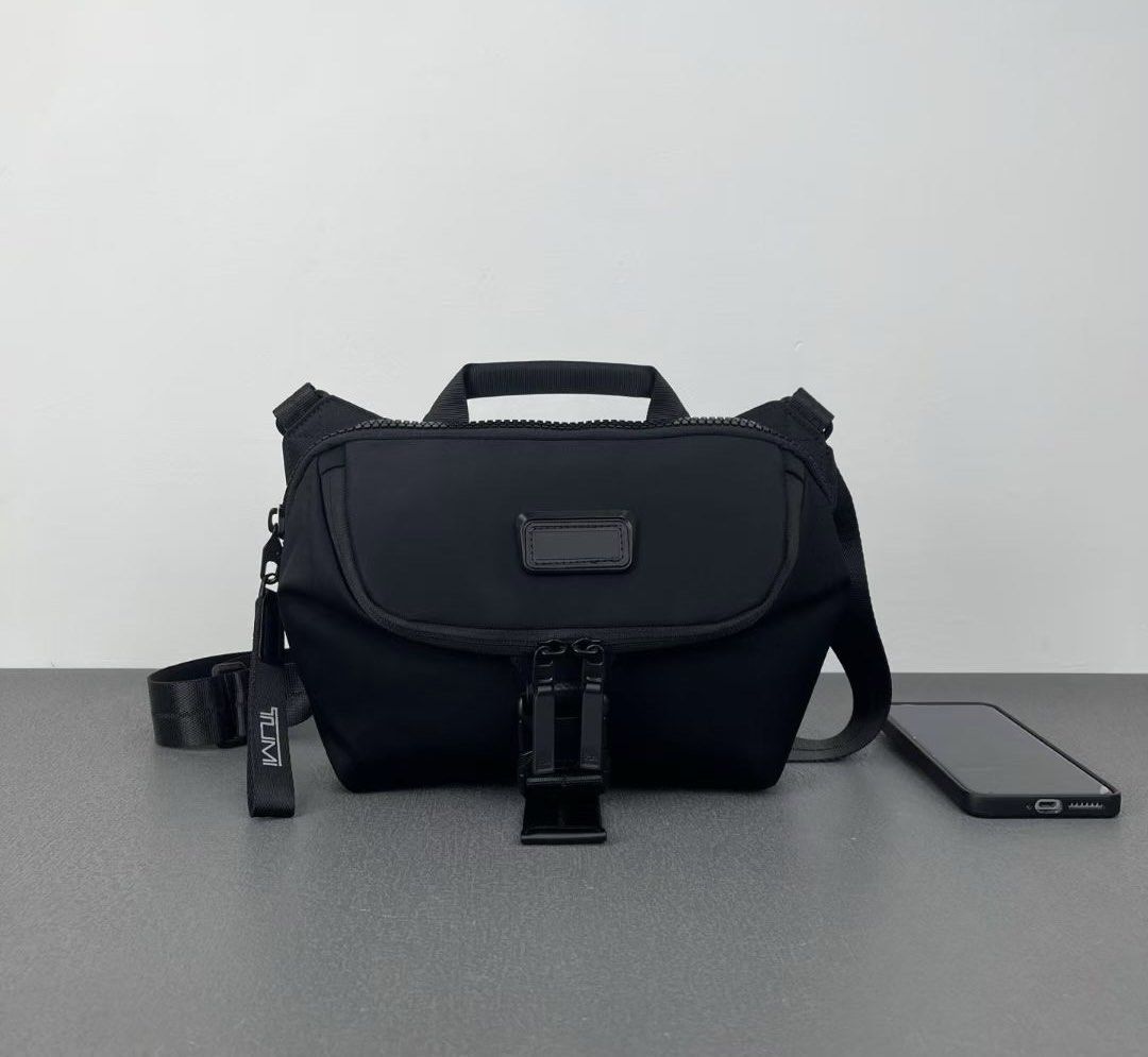 Tumi Tahoe Dunlap Crossbody Bag (Category: Sling Bags) located in Manila. Submitted by bagmaniaph (Listing ID 1433949953, Image 1). Description: Perfect for traveling or storing your everyday essentials, this compact crossbody features multiple pockets and a key leash for easy organization..