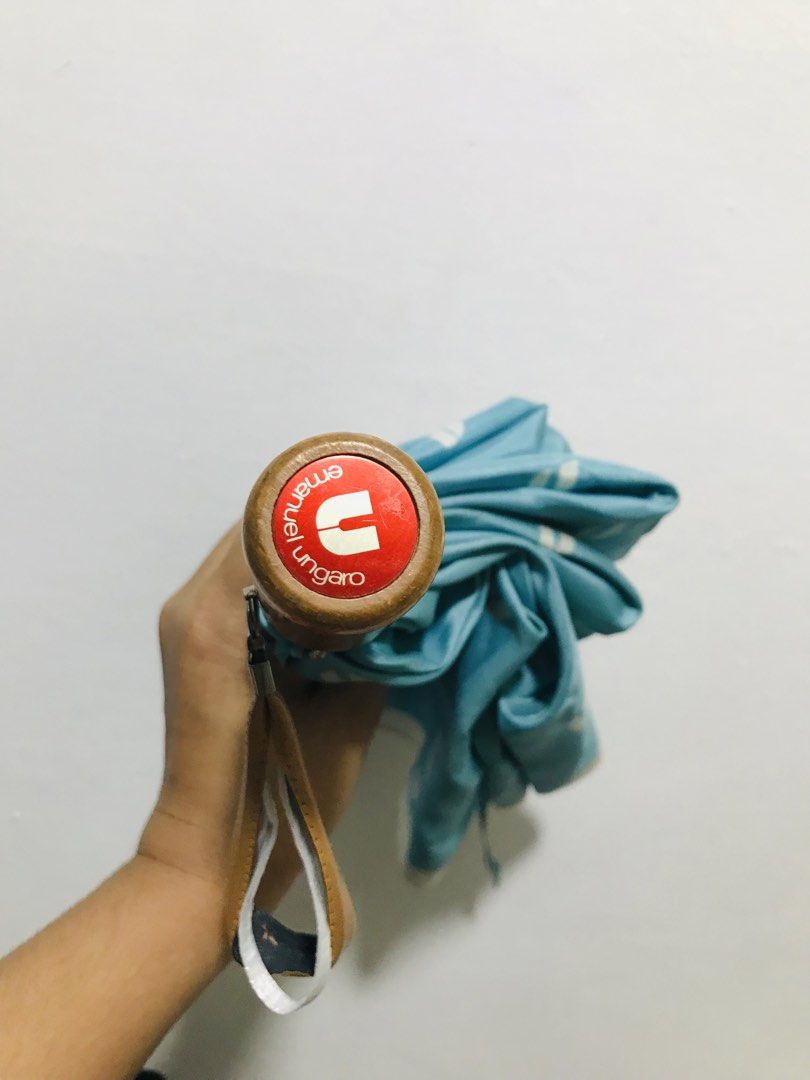 UNGARO SILK UMBRELLA (Category: Umbrellas) located in Gamu. Submitted by 2022bagsbunny (Listing ID 1433821898, Image 2). Description: .