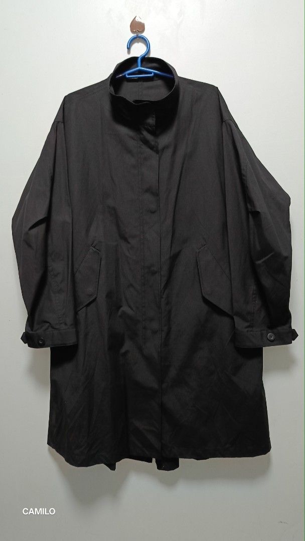 Uniqlo Black Long Coat small 22x36 (Category: Coats, Jackets and Outerwear) located in San Jose del Monte. Submitted by qu4litees (Listing ID 1433934913, Image 2). Description: - Uniqlo long coat - Size: S 22x36 - Features: - Stand collar - Button-down closure - Adjustable cuffs - Two front pockets - Drawstring waist - Made in China.