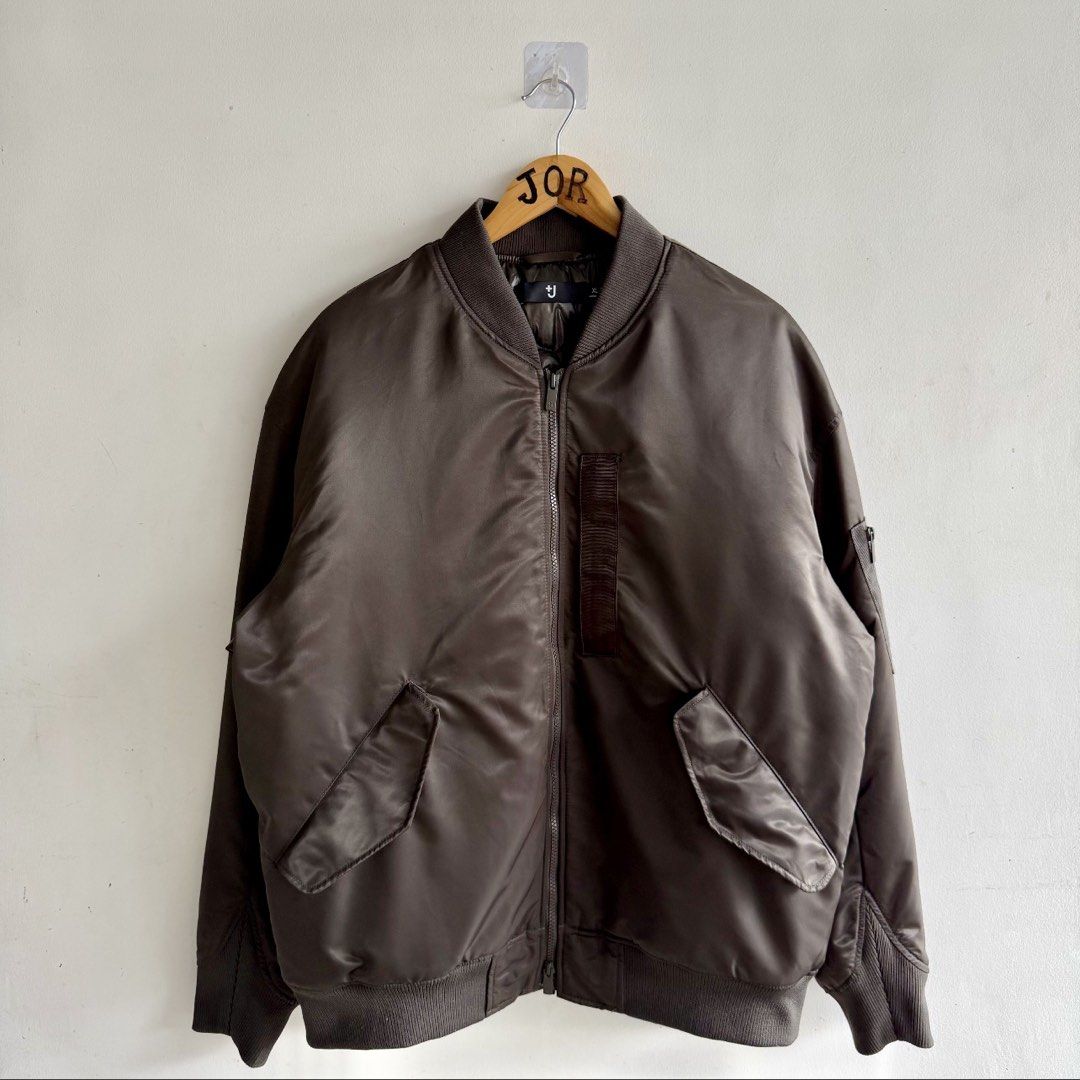 Uniqlo +J Hybrid Down Oversized Blouson (Category: Coats, Jackets and Outerwear) located in Paranaque City. Submitted by headyslimane (Listing ID 1433785660, Image 1). Description: Uniqlo X +J Hybrid Down Oversized MA-Blouson Quilted inside XL on tag 27 Width 29 Length Excellent to new condition.