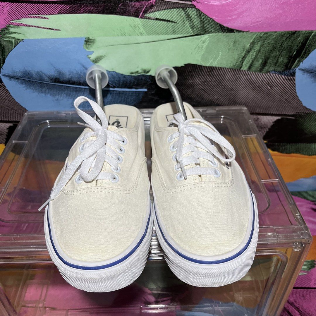 Vans Authentic Mule Off-White (Category: Sneakers) located in Leyte. Submitted by shoptastic_ph (Listing ID 1433972392, Image 3). Description: - Vans Authentic Mule - Color: Off-white - Size: US Women's 10.5 / US Men's 9 - Features: - Canvas upper - Slip-on design - White midsole with blue stripe - Gum rubber outsole - Vans logo detail.